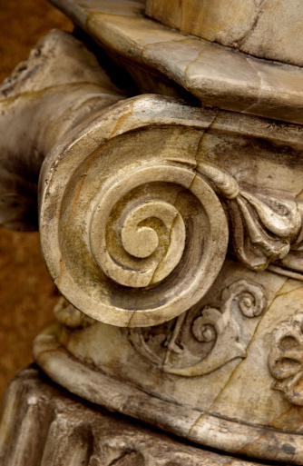 close up of architectural work on column