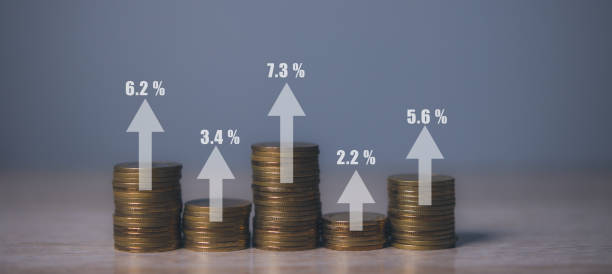 istock Stacking coins different height for interest rates from different investment. 1604546553