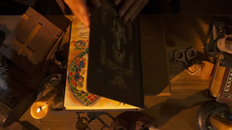 HD: Scribe Examining His Book