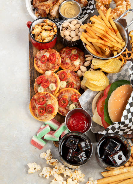 istock Fast food. American food on grey background. 1604552193