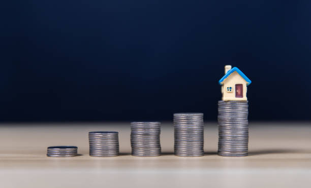 istock stacked coins Interest from a house or condo 1604552842