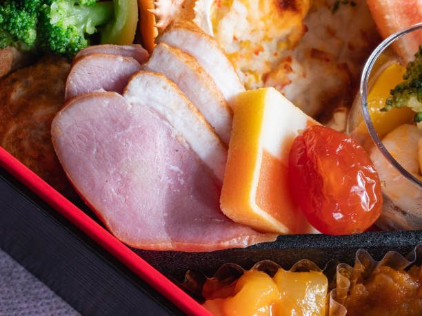 istock Japanese osechi dish. Duck ham. dried tomatoes. 1604590038