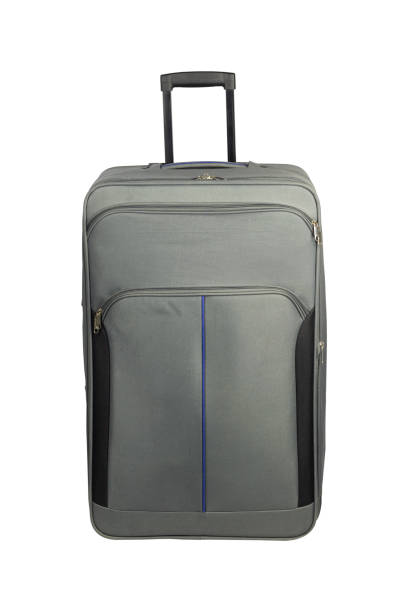 istock travel bag, travel suitcase isolated from background 1604694543