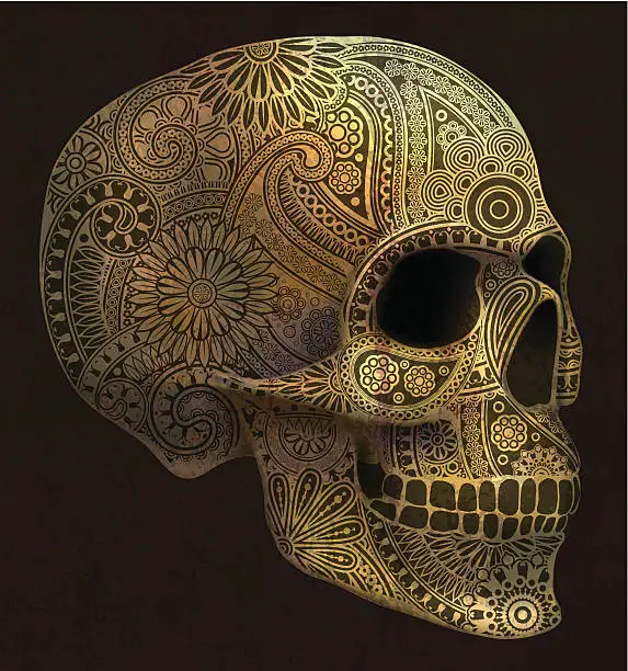 Vector illustration of Decorative golden skull with paisley