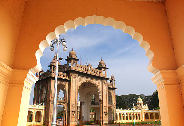 Entrance of majestic mysore palace from an arch stock photo