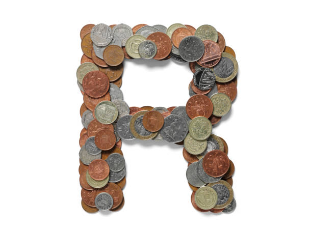 letra r en moneda británica - two pound coin fotografías e imágenes de stock