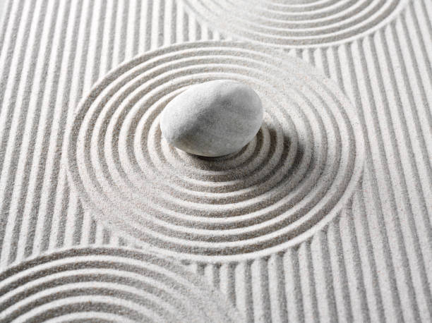 istock One Rock in a Circle of Lines 160476407