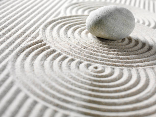 istock Zen Pebble and Circles in sand 160476529