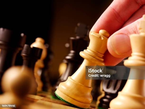 Moving A Chess Queen Stock Photo - Download Image Now - Achievement, Activity, Bishop - Chess Piece