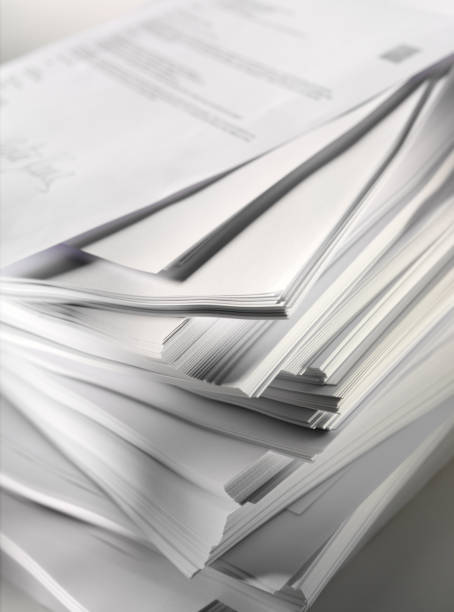 istock Pile of Paper and Writing 160478533