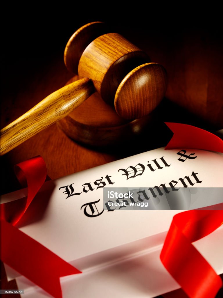 Will and Testament Gavel and block on the desk, with last will and testament papers.  Will - Legal Document Stock Photo