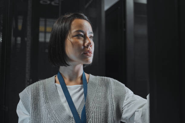 istock Serious, maintenance or IT woman in server room for analysis, engineer working in data center. Thinking, cybersecurity and girl programmer with tech for problem solving, diagnose or troubleshooting 1604798827