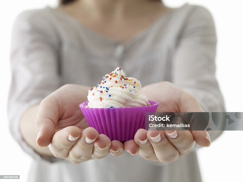 cupcake woman holding cupcake Cupcake Stock Photo