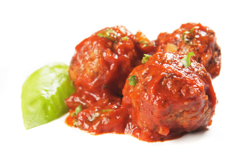 Meatballs in tomato sauce isolated on white background