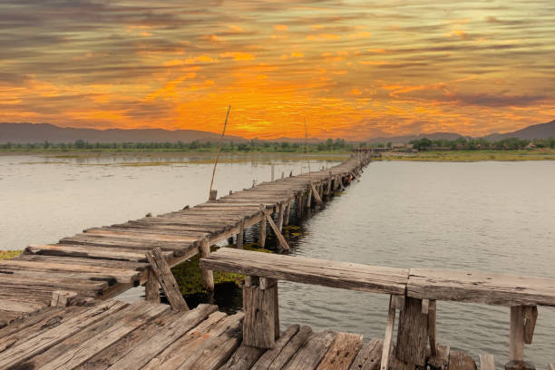 istock old wooden bridge on big lake 1604828295
