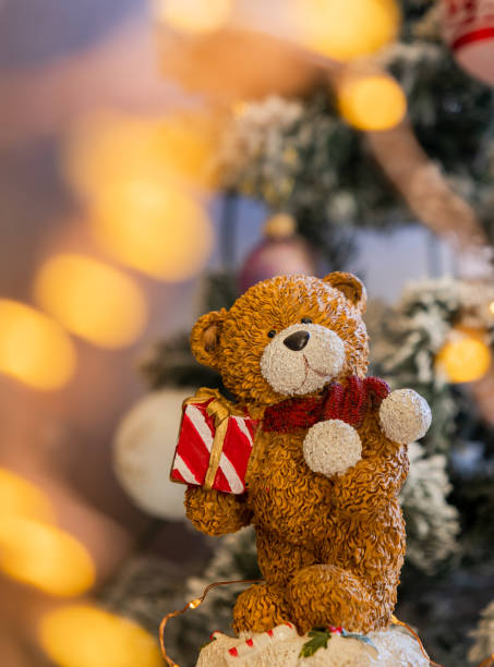 istock teddy bear decoration for christmas with fairy lights 1604828861