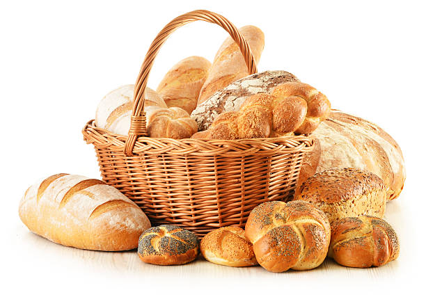 istock Bread and rolls in wicker basket isolated on white 160484207