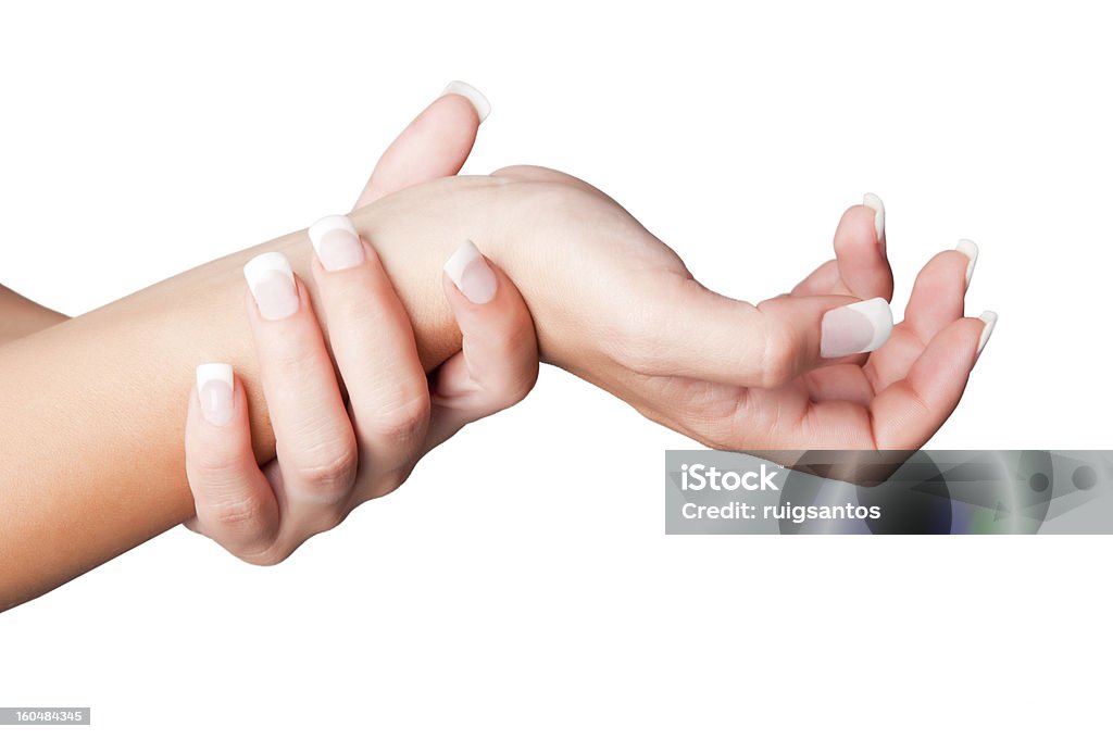 Wrist Pain Female with pain in her wrist, isolated in a white background Adult Stock Photo