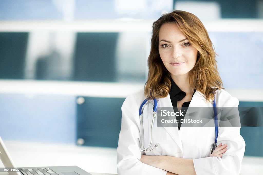 Young Woman Caucasian Doctor Nurse in Healthcare Office Clinic Young Woman Caucasian Doctor Nurse in Healthcare Office Clinic  20-29 Years Stock Photo