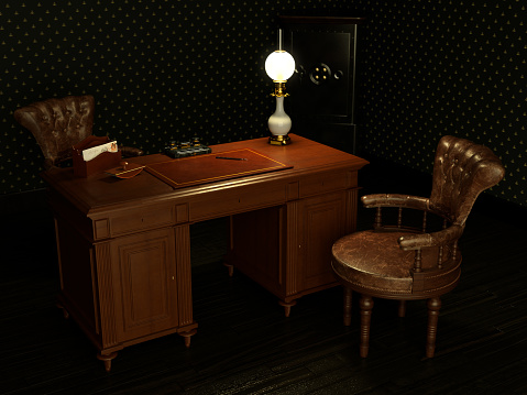 Un bureau dans le style Napoleon 3, second empire avec la lampe à pétrole, le buvard, le range-lettres et l'encrier.