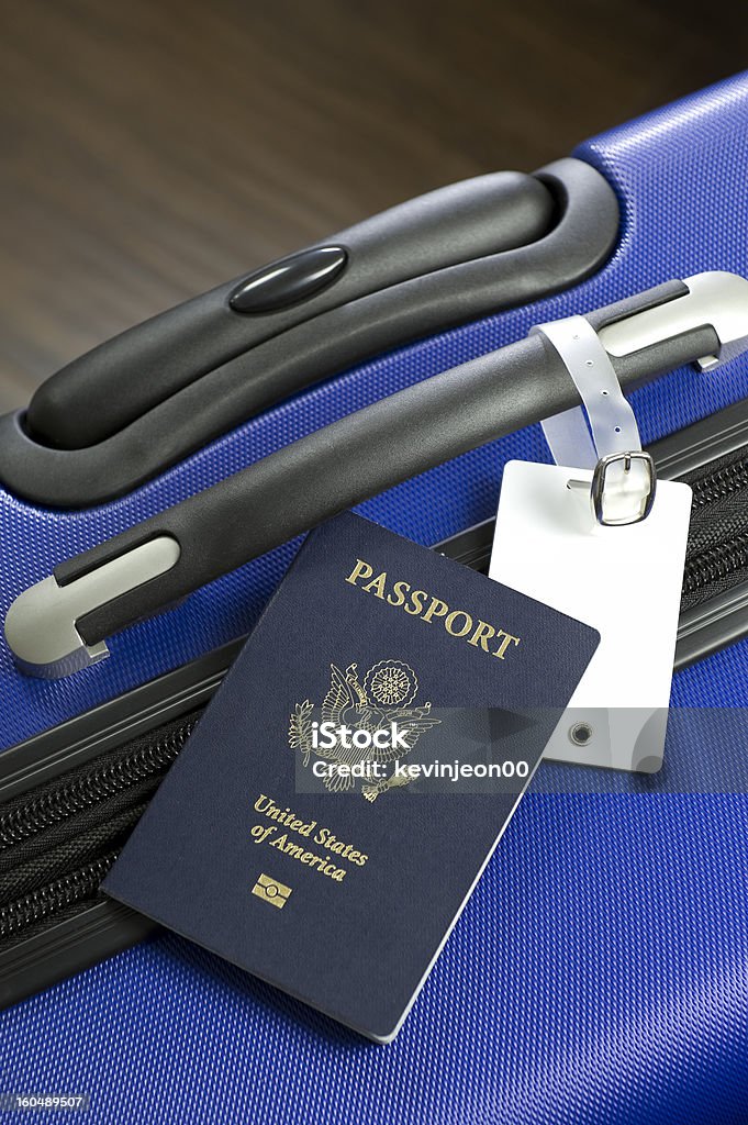 Passport and Luggage http://www.istockphoto.com/file_thumbview_approve.php?size=1&id=16138678 Luggage Tag Stock Photo