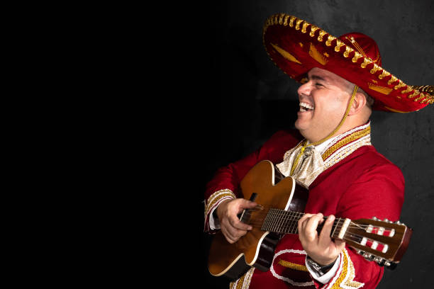 Mexican mariachi musician on a black background