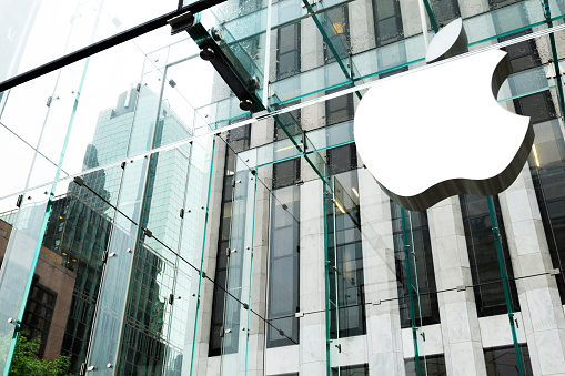 New York City, USA - May 19th 2011: The Apple Macintosh logol over the entrance of the Apple store at 5th Avenue in Manhattan, New York City.