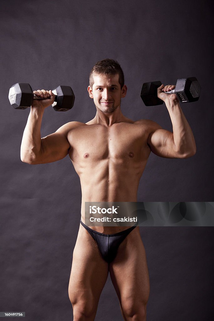 Jovem bodybuilder traininig - Royalty-free Adulto Foto de stock