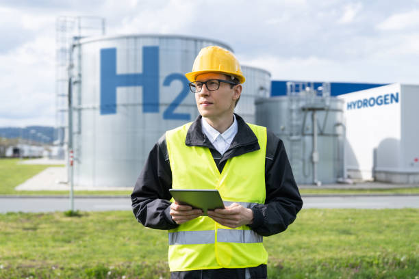 istock Engineeron a background of Hydrogen factory 1604922971