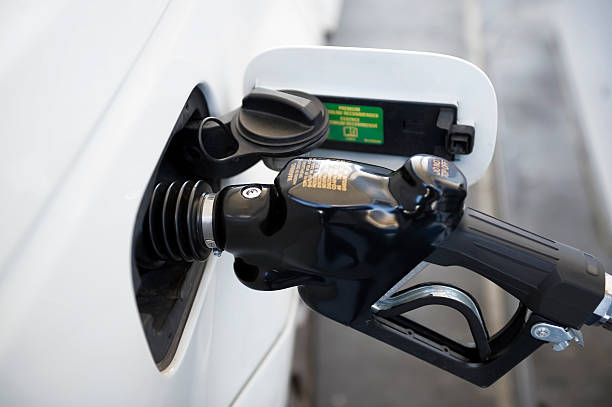 istock Gasoline Nozzle Filling Car 160495286