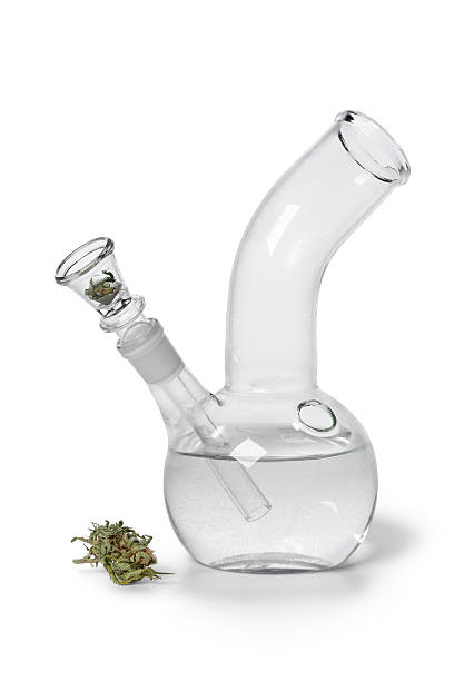 Water pipe with Marijuana bud Glass Water pipe with Marijuana bud on white background bong stock pictures, royalty-free photos & images