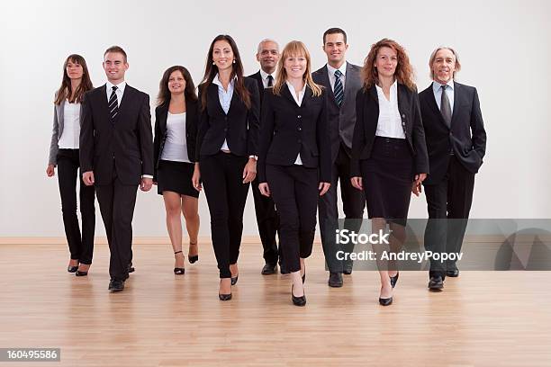Group Of Business Executives Approaching Stock Photo - Download Image Now - Walking, Approaching, Business Person
