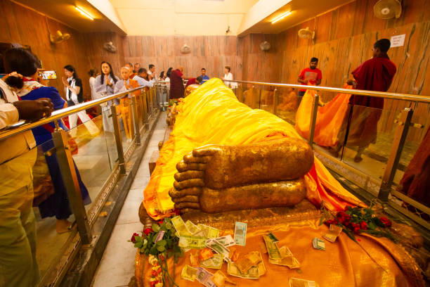 Sleeping buddha statue stock photo