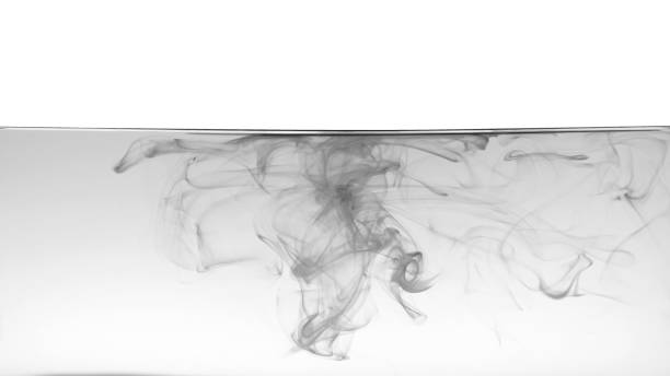 istock Black color or ink is smoke on white background,Abstract smoke pattern,Colored liquid dye,Splash paint 1604984775