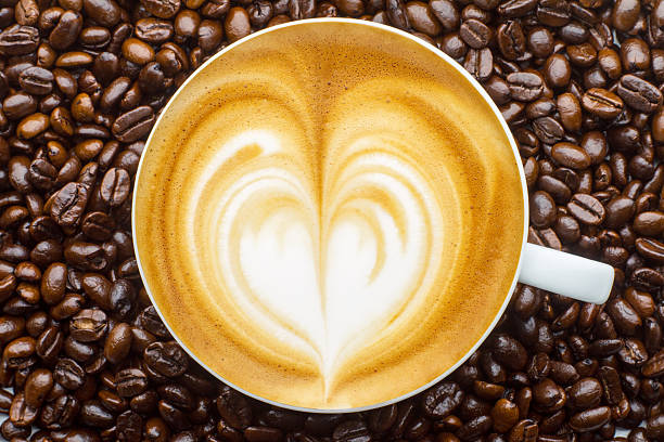 istock Latte art, coffee in beans background 160498608