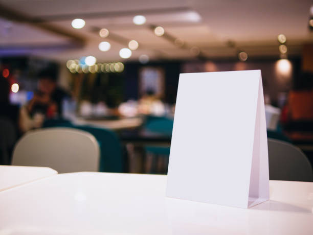 istock Mock up Menu sign on Table Bar cafe restaurant interior 1605012568