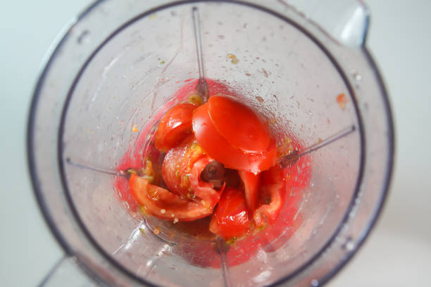 istock tomato in the food processor view from above 1605014211
