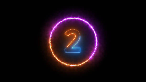 istock Number two glowing in the dark orange blue neon light 1605016043