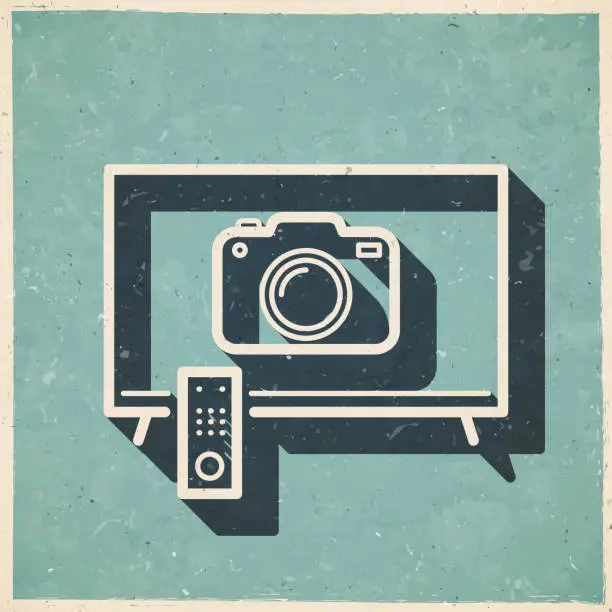 Vector illustration of TV with camera. Icon in retro vintage style - Old textured paper