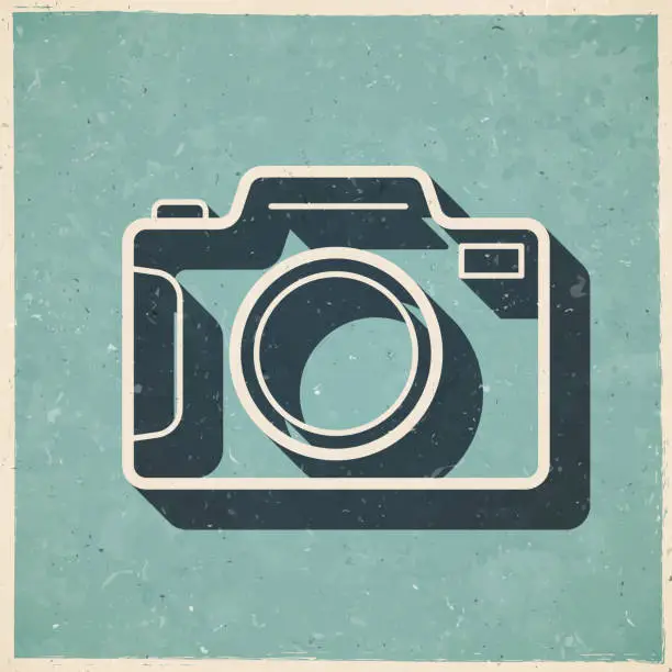 Vector illustration of Photo camera. Icon in retro vintage style - Old textured paper