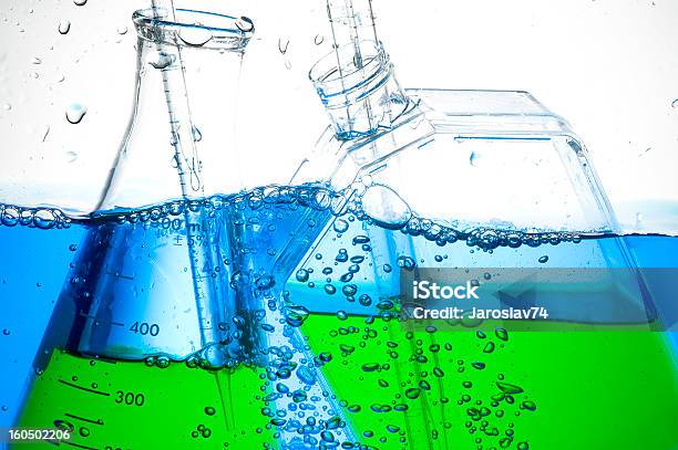 Laboratory Glass Stock Photo - Download Image Now - Beaker, Blue, Bubble