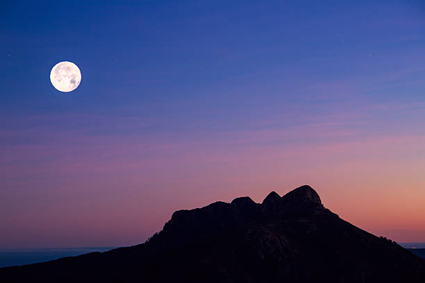 Moon and mountain stock photo