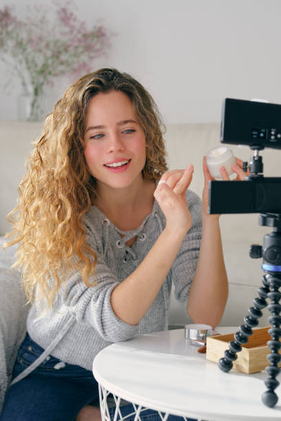 istock Vlogger talking about new anti aging cream 1605075975