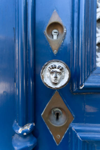 istock vintage antique blue door close-up 1605081098