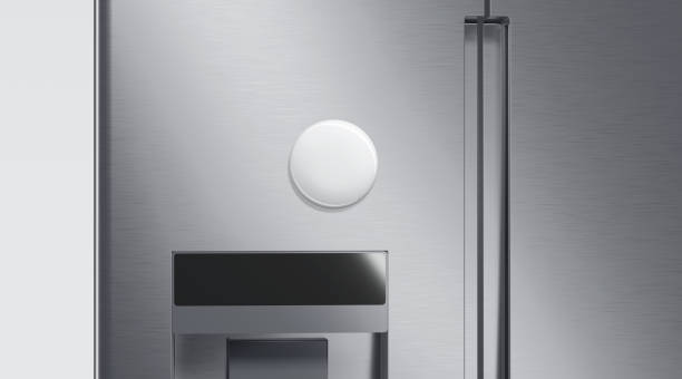 istock Blank white round magnet on fridge mockup, front view 1605081135