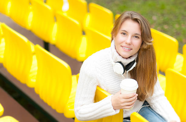 istock Young female student having rest outdoor. 160509625