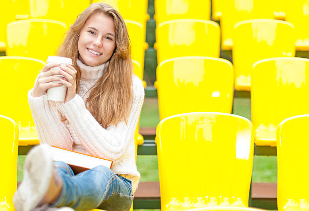 istock Young female student having rest outdoor. 160509703