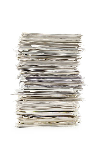 istock Pile of papers on white 160510135