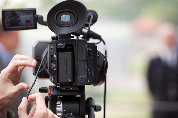 istock Covering an event with a video camera 160510834