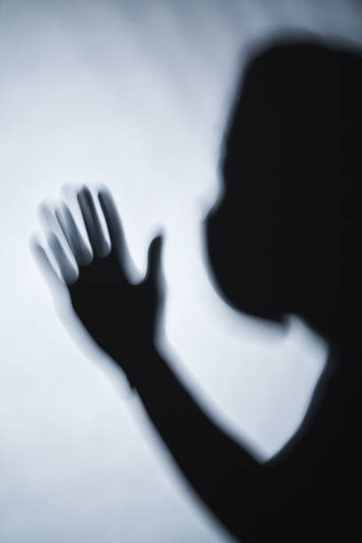 istock Shadow of masked person 160513080